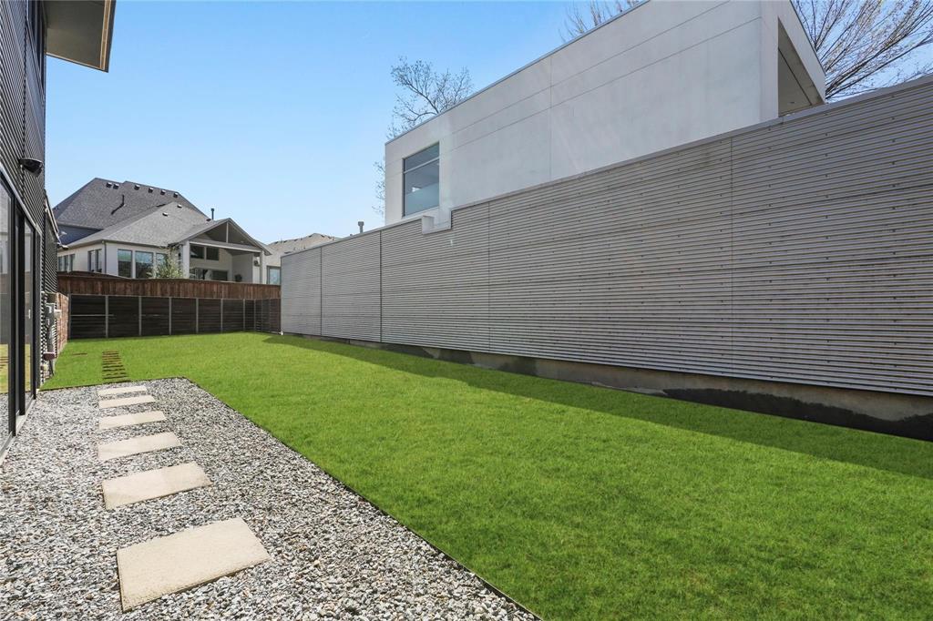 6 Vanguard Way Dallas, TX 75243 - Photo 31 of 35 a view of a back yard of the house