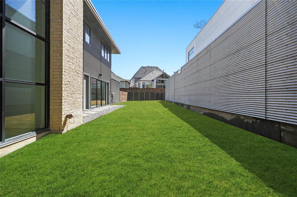 6 Vanguard Way Dallas, TX 75243 - Photo 34 of 35 a view of a back yard of the house