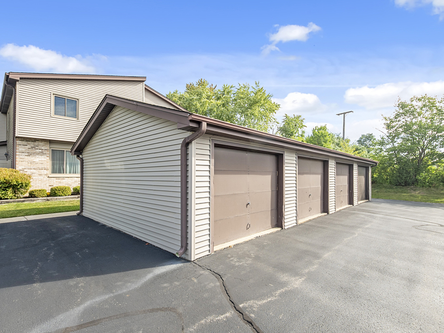 1032 Schoolgate Road New Lenox, IL 60451 - Photo 23 of 23 a front view of a house with a yard and garage