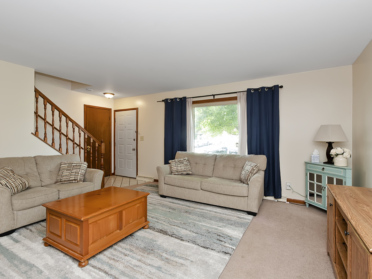 1032 Schoolgate Road New Lenox, IL 60451 - Photo 5 of 23 a living room with furniture flat screen tv and a large window