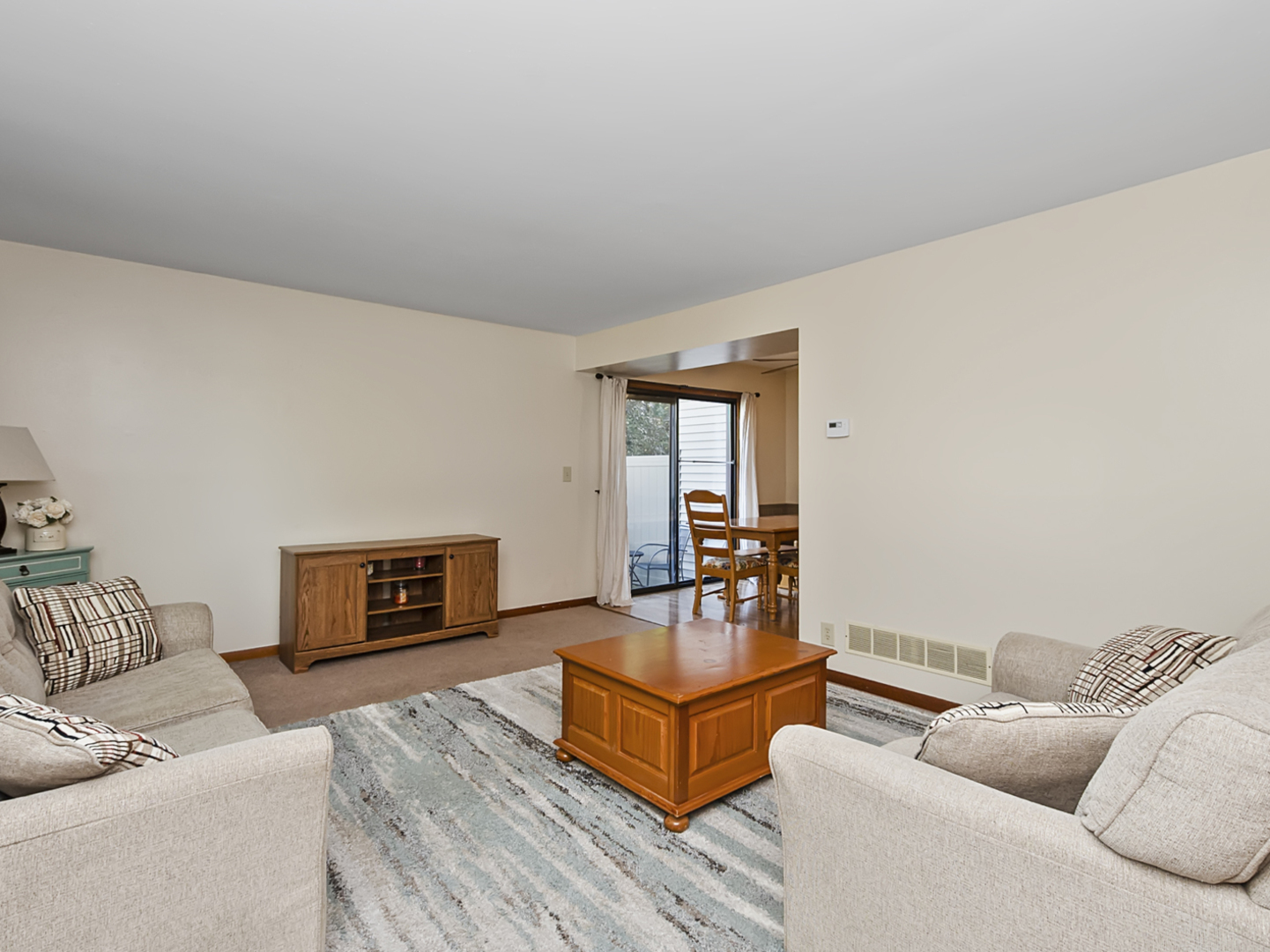 1032 Schoolgate Road New Lenox, IL 60451 - Photo 7 of 23 a living room with furniture and a fireplace