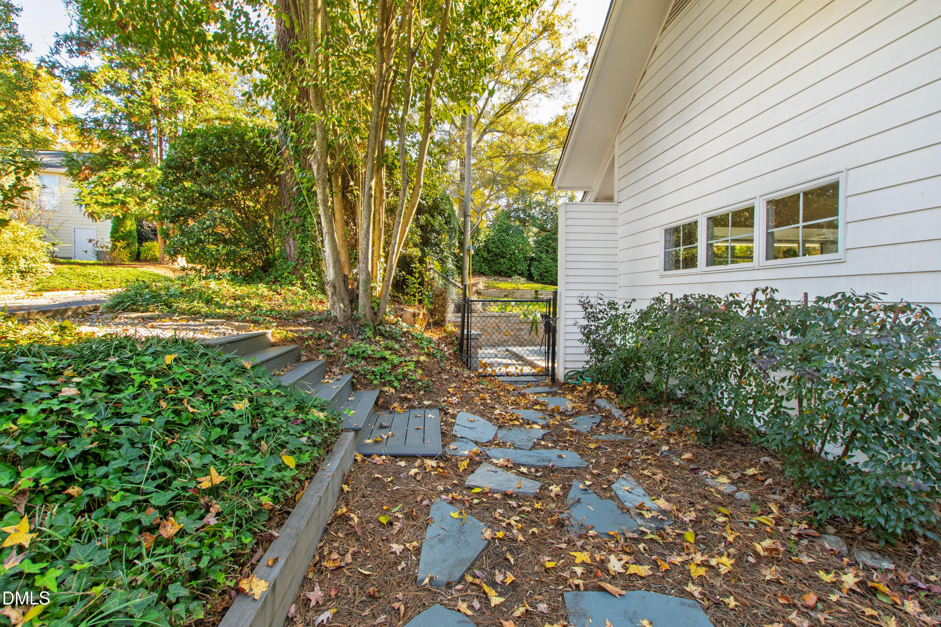 2803 Wayland Drive Raleigh, NC 27608 - Photo 38 of 40 a backyard of a house with outdoor seating
