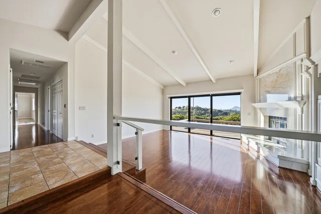 a kitchen with stainless steel appliances granite countertop a stove microwave and sink