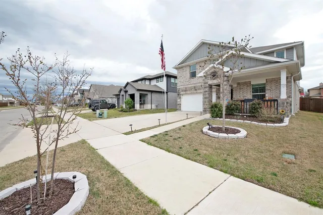 a front view of a house with entertaining space