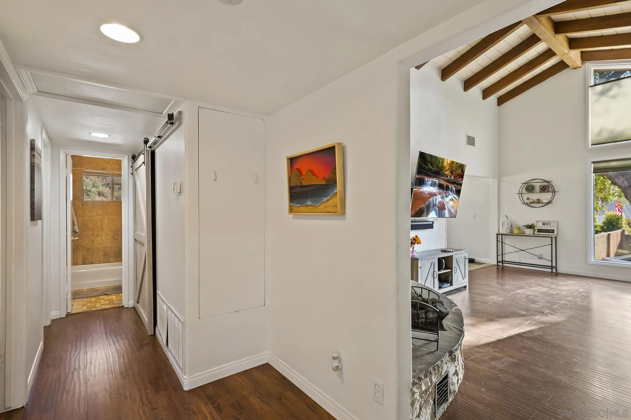 14725 Lyons Valley Road Jamul, CA 91935 - Photo 16 of 57 a view of a hallway with wooden floor and closet