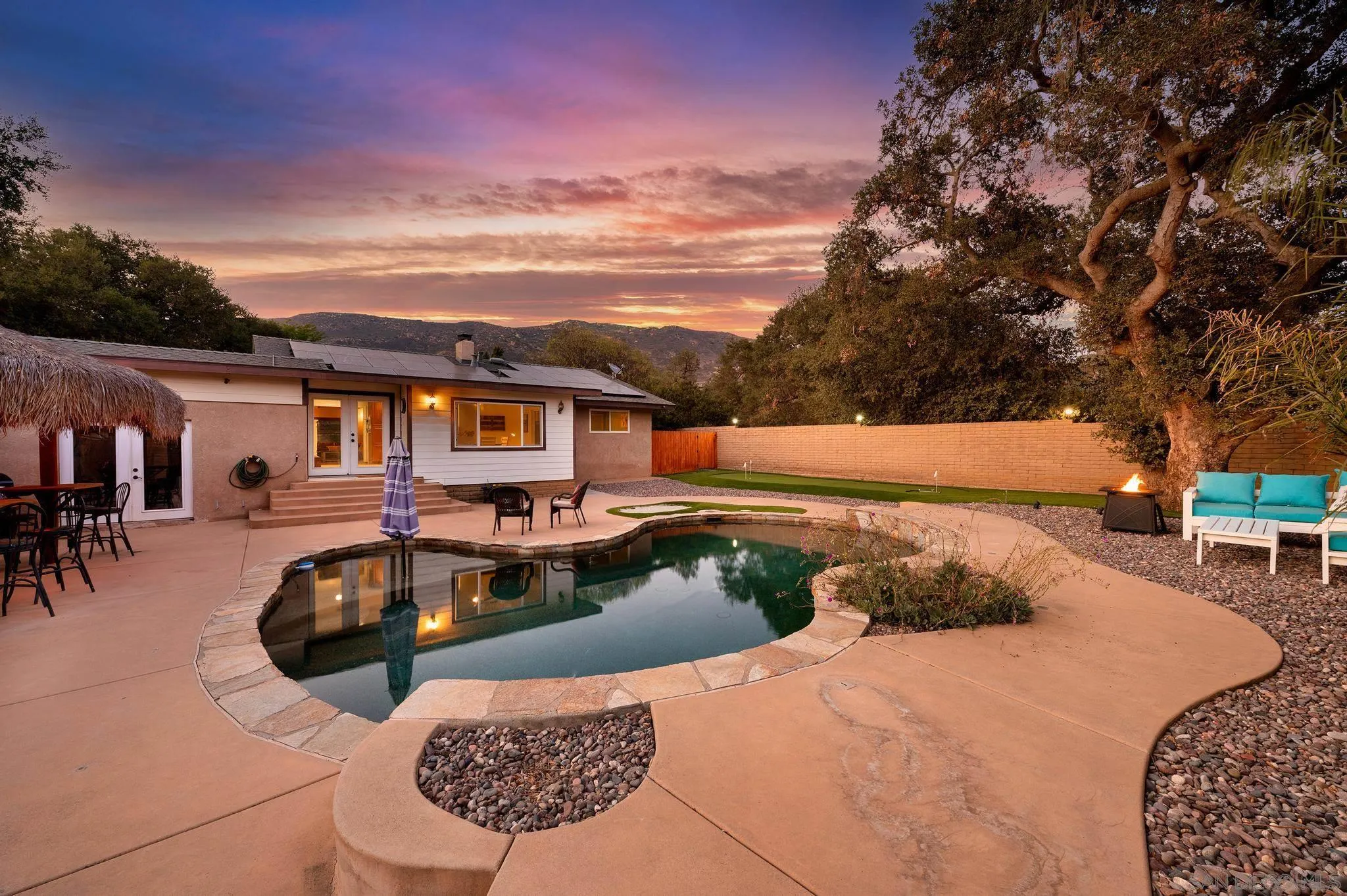 14725 Lyons Valley Road Jamul, CA 91935 - Photo 29 of 57 a front view of house with outdoor space and swimming pool