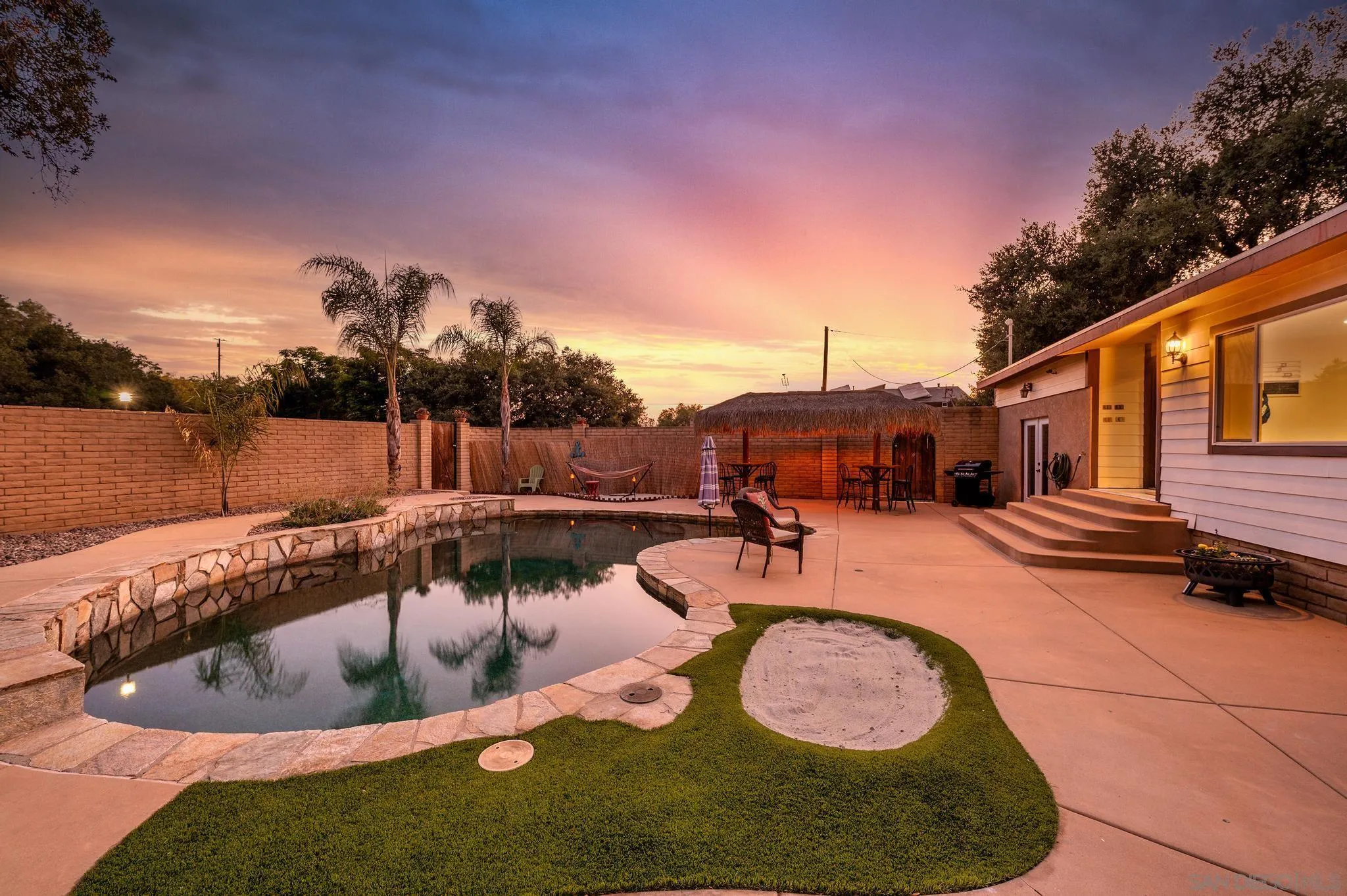 14725 Lyons Valley Road Jamul, CA 91935 - Photo 33 of 57 a view of a swimming pool with a patio