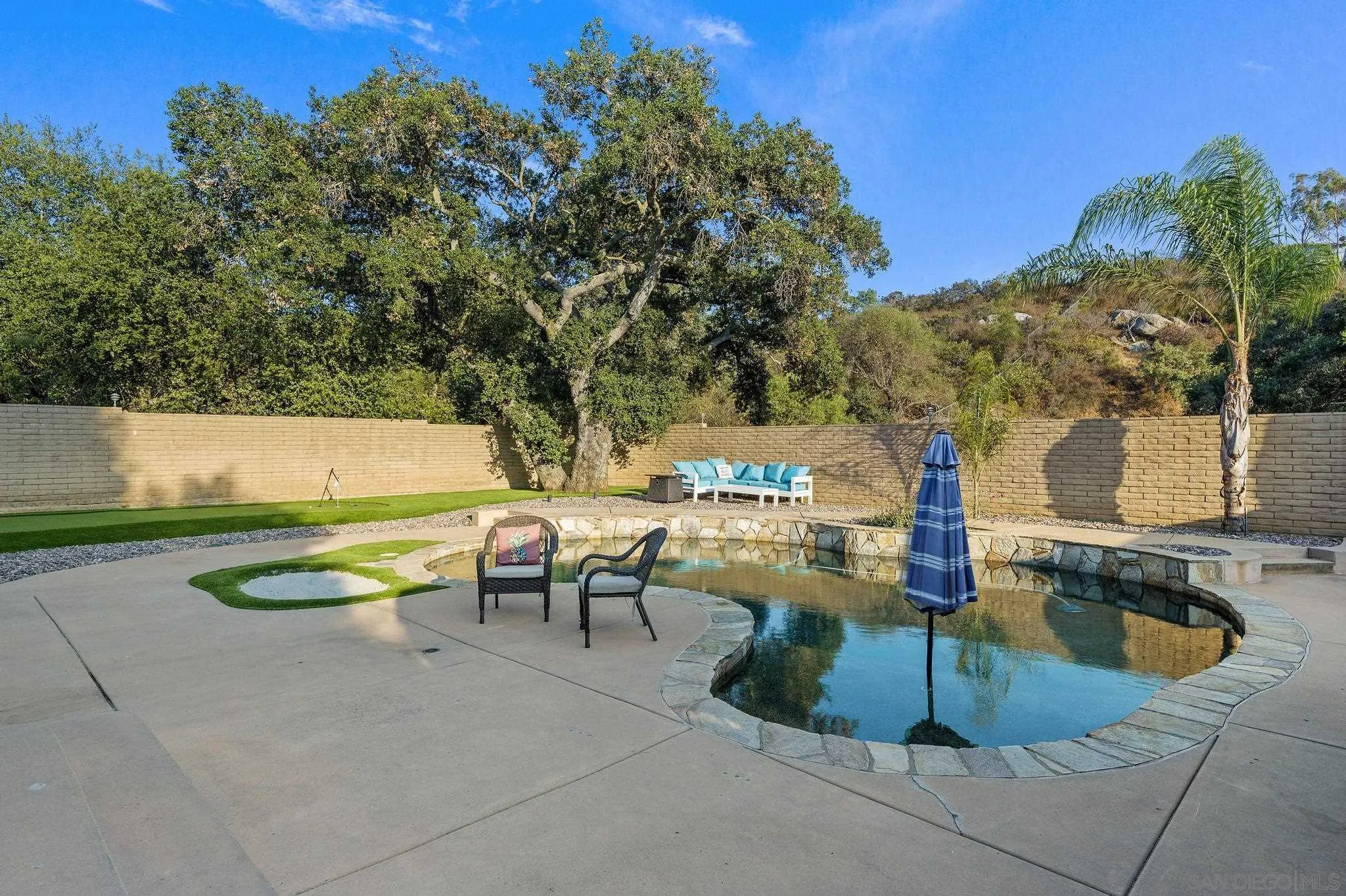 14725 Lyons Valley Road Jamul, CA 91935 - Photo 39 of 57 a view of a backyard with sitting area