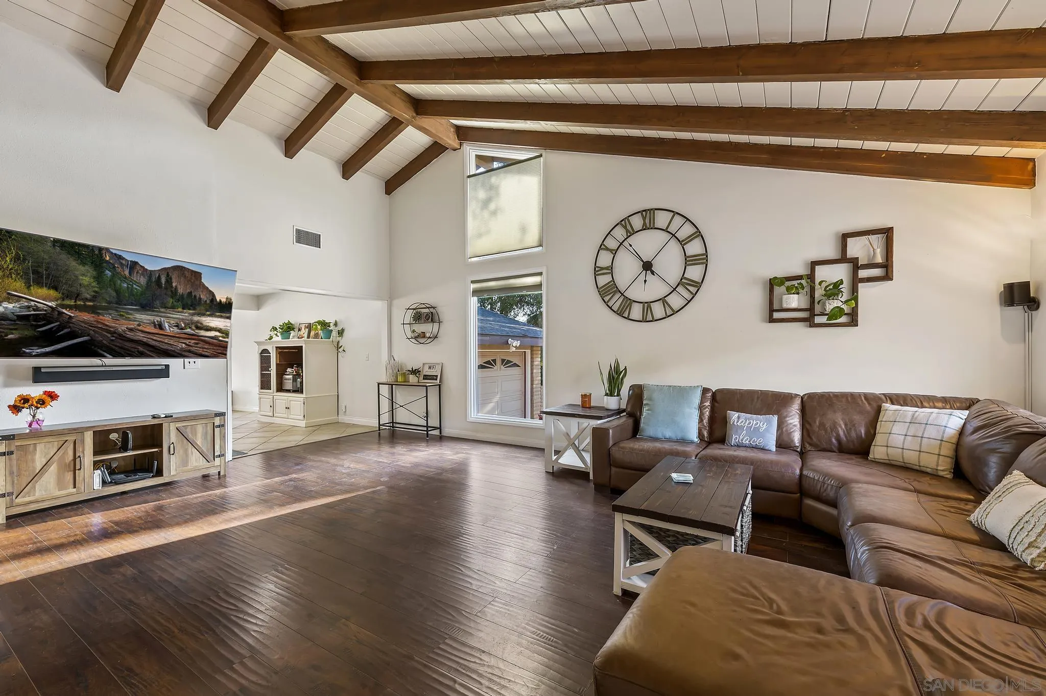 14725 Lyons Valley Road Jamul, CA 91935 - Photo 4 of 57 a living room with furniture and a flat screen tv