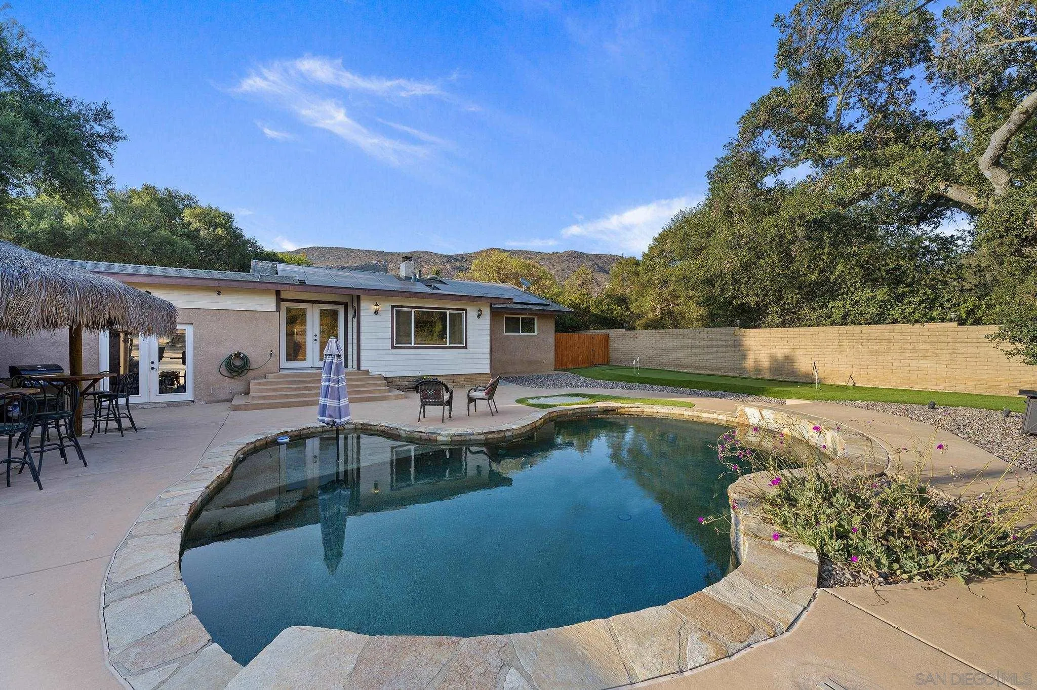 14725 Lyons Valley Road Jamul, CA 91935 - Photo 43 of 57 a view of a house with pool