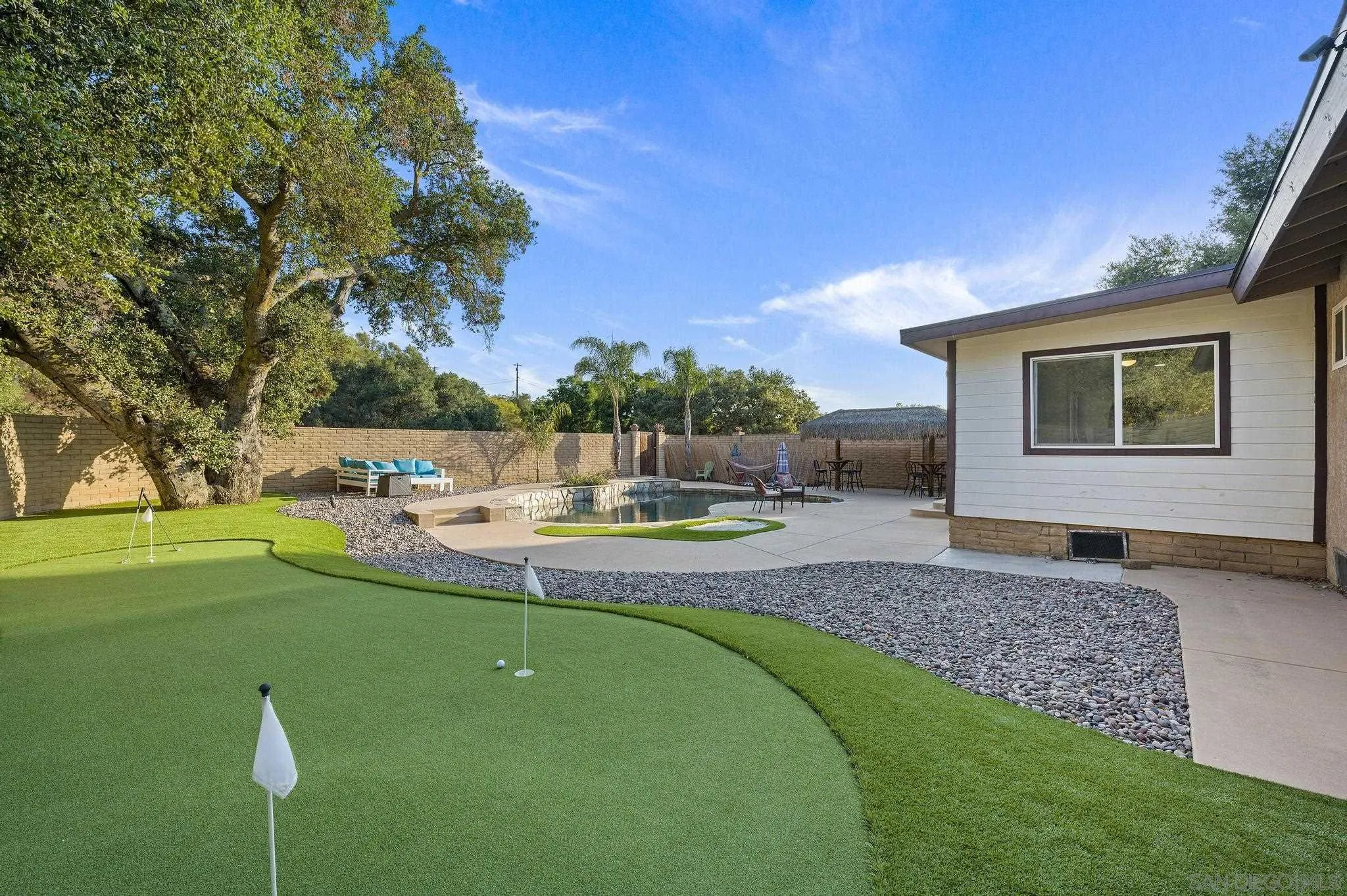 14725 Lyons Valley Road Jamul, CA 91935 - Photo 45 of 57 a view of a house with a backyard