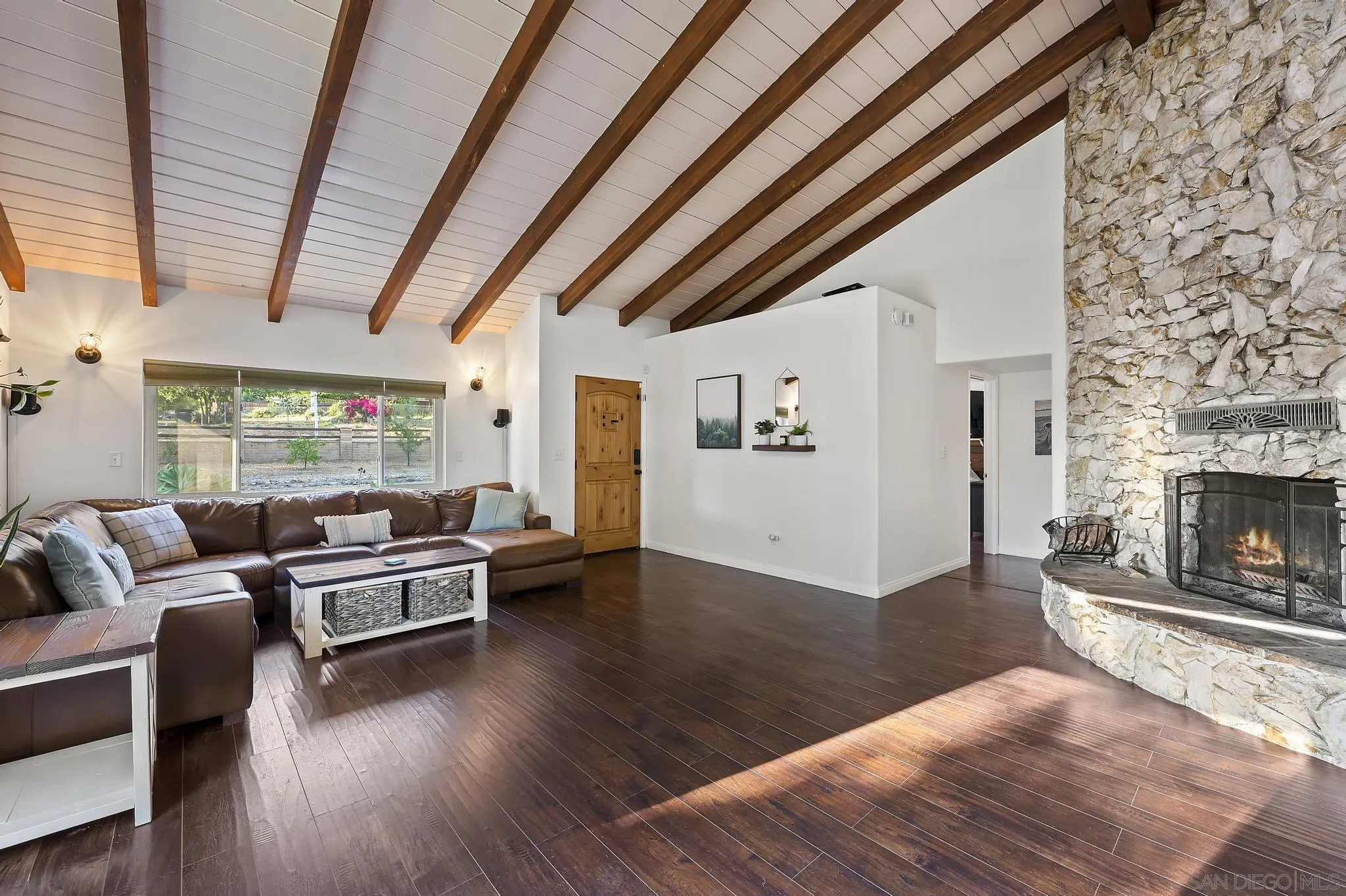 14725 Lyons Valley Road Jamul, CA 91935 - Photo 6 of 57 a living room with furniture and a fireplace