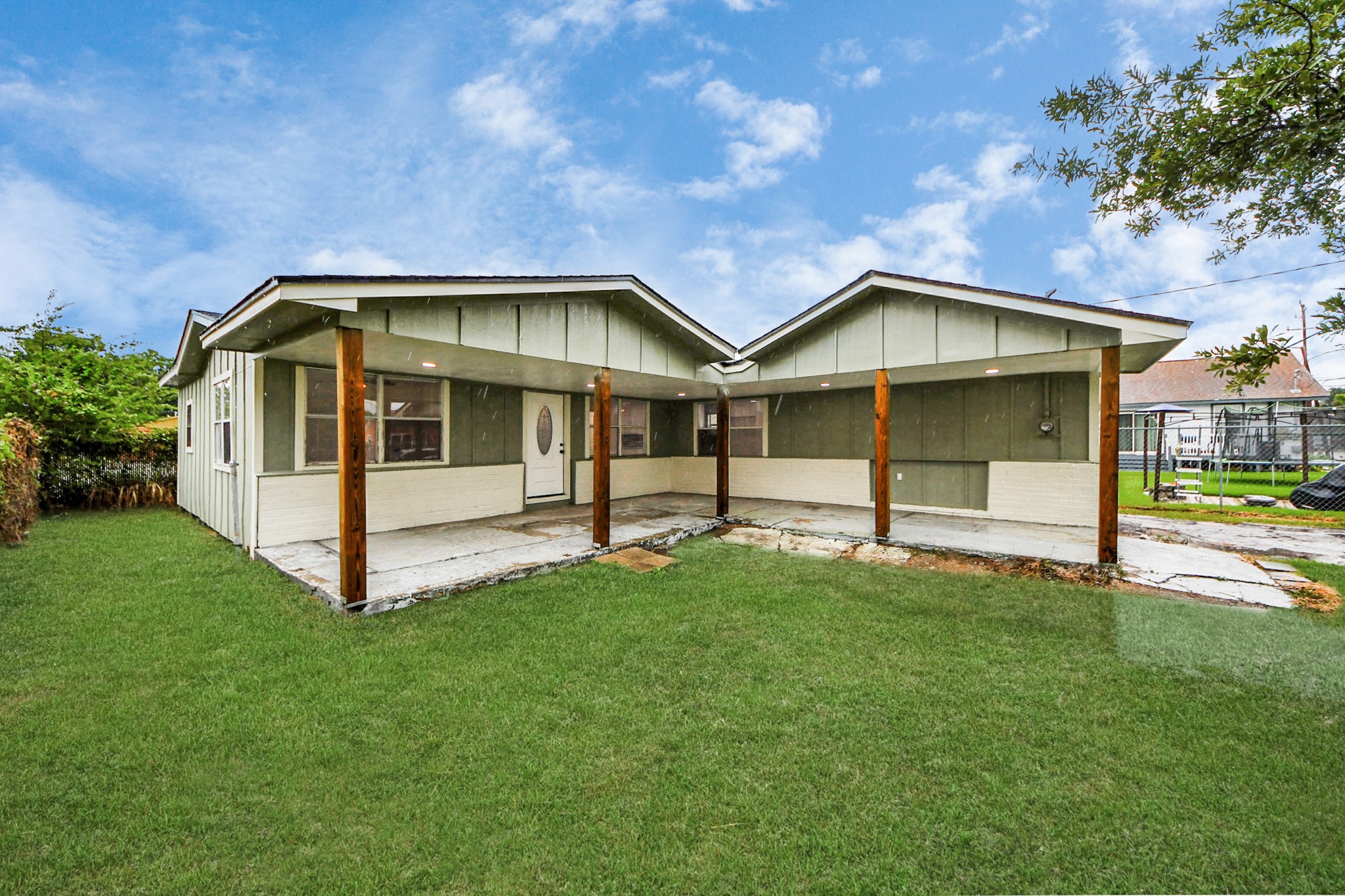 207 East Defee Avenue Baytown, TX 77520 - Photo 4 of 36 a view of a house with a yard patio and a yard