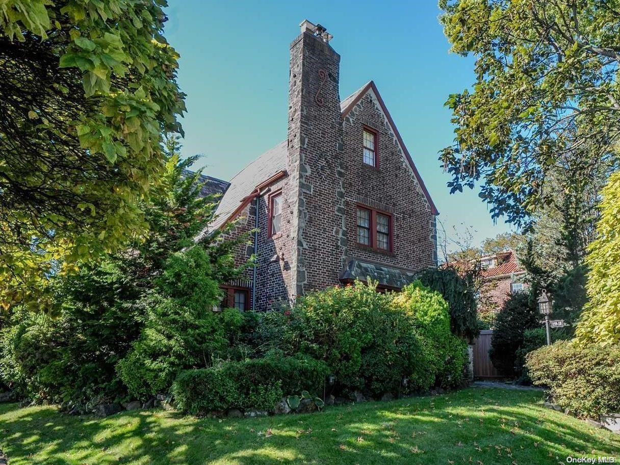 159-18 28th Avenue Queens, NY 11358 - Photo 1 of 1 a view of a house with a yard and plants