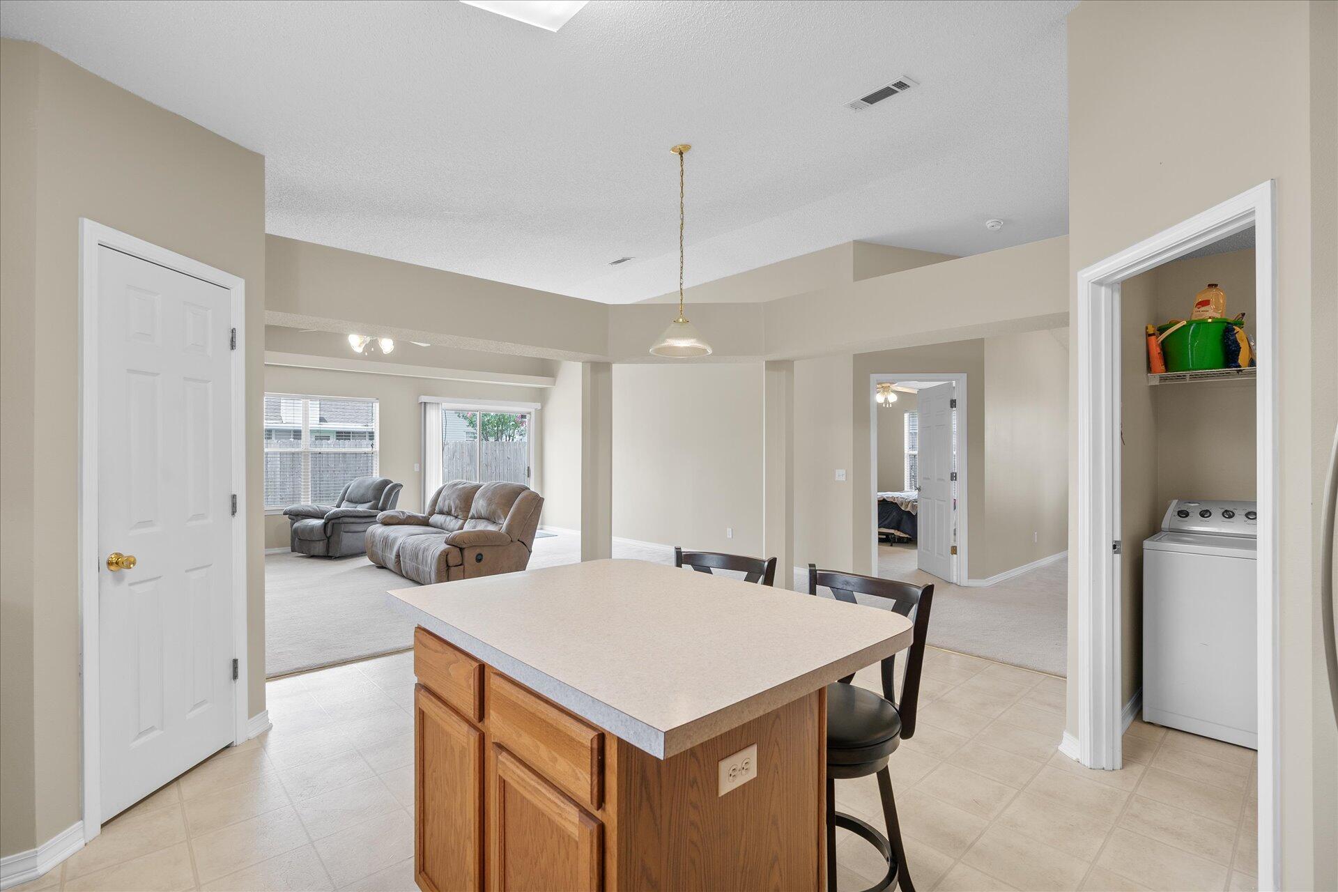 118 Sandstone Trail Crestview, FL 32539 - Photo 20 of 33 a view of a kitchen and dining room