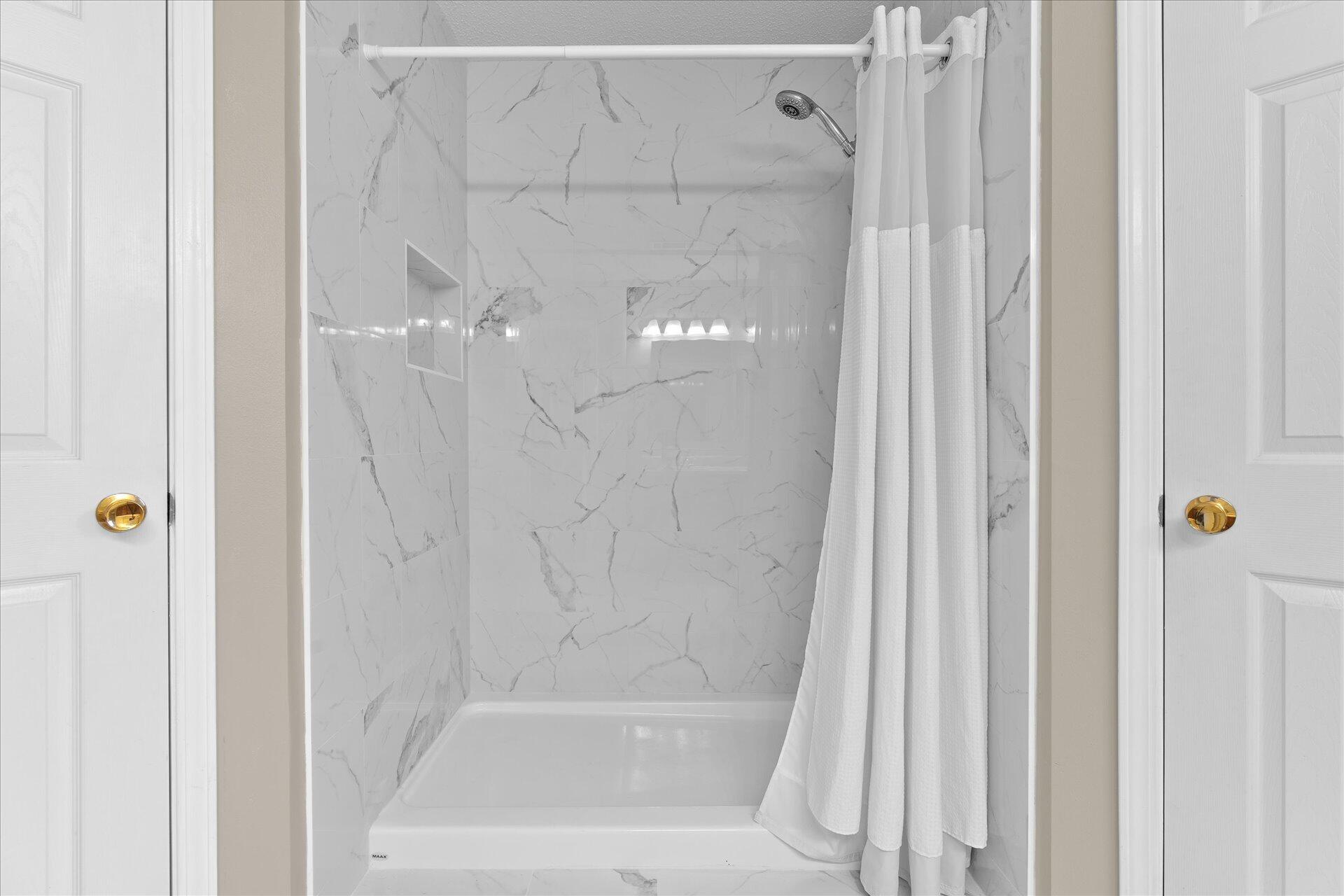 118 Sandstone Trail Crestview, FL 32539 - Photo 25 of 33 a bathroom with a shower