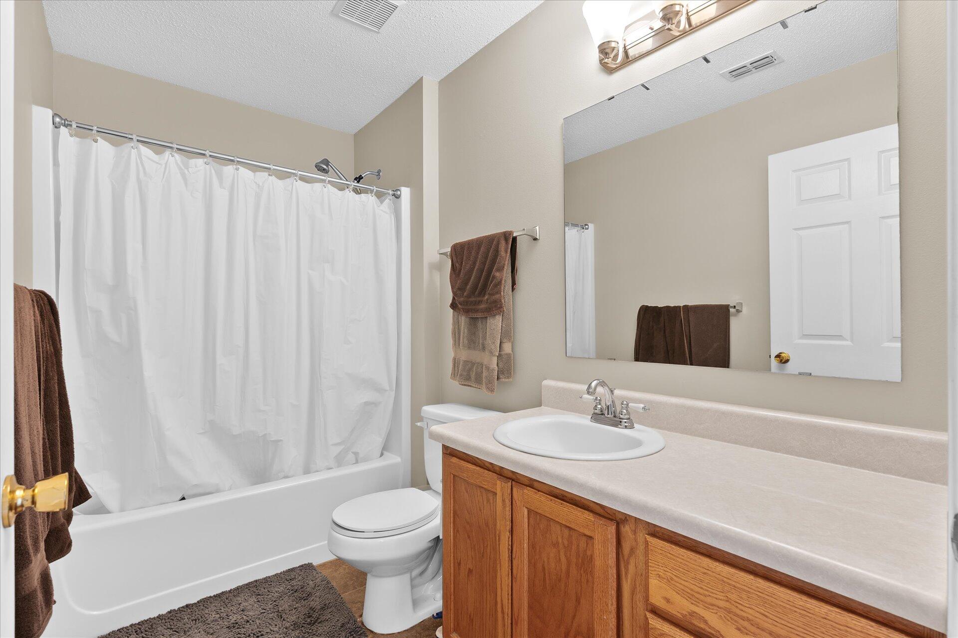118 Sandstone Trail Crestview, FL 32539 - Photo 28 of 33 a bathroom with a sink toilet and shower