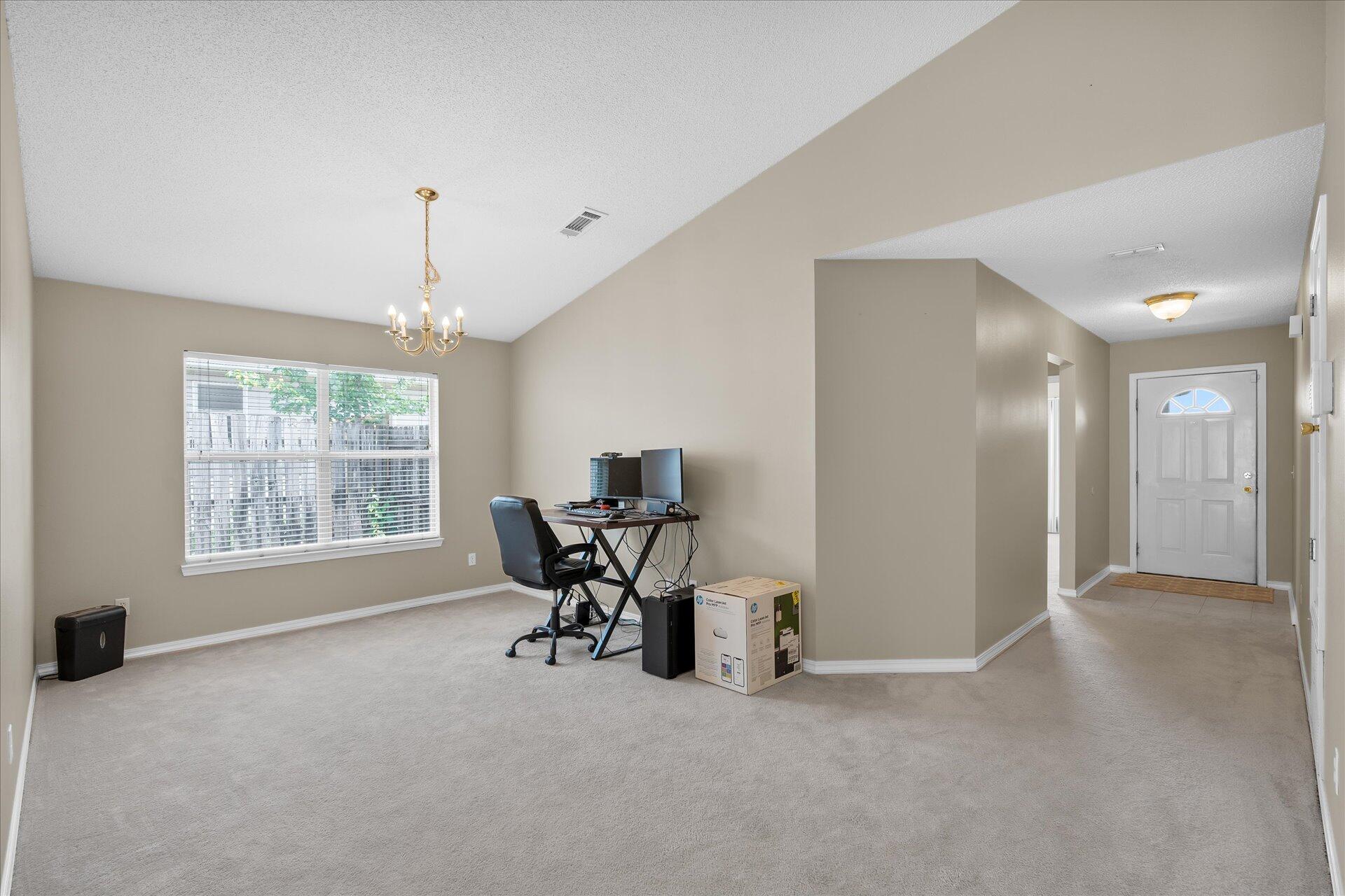 118 Sandstone Trail Crestview, FL 32539 - Photo 6 of 33 a view of a livingroom with a workspace