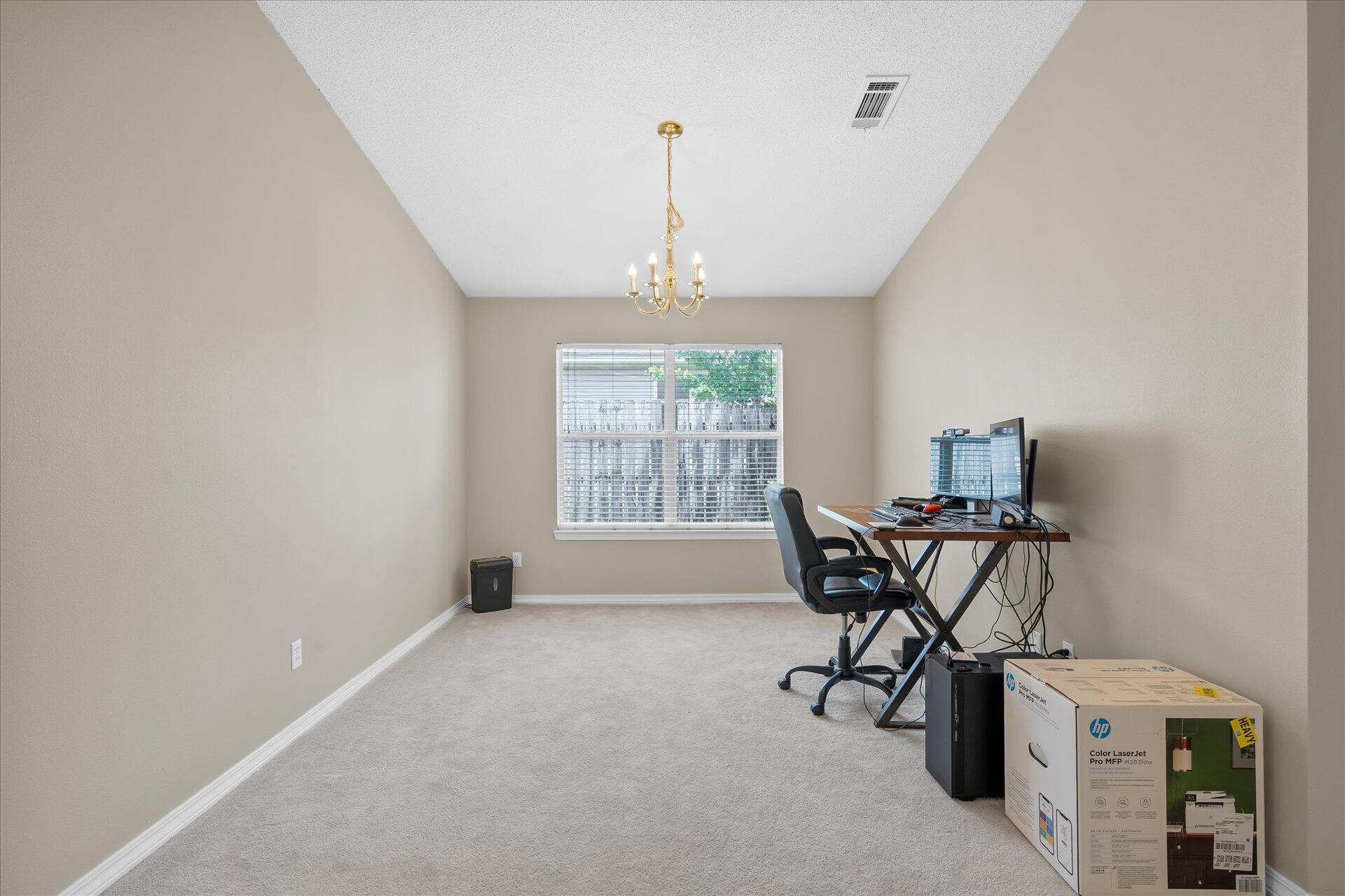 118 Sandstone Trail Crestview, FL 32539 - Photo 7 of 33 a view of a room with furniture and windows
