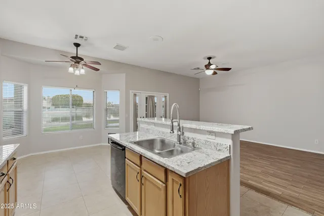 a bathroom with a sink vanity and a mirror