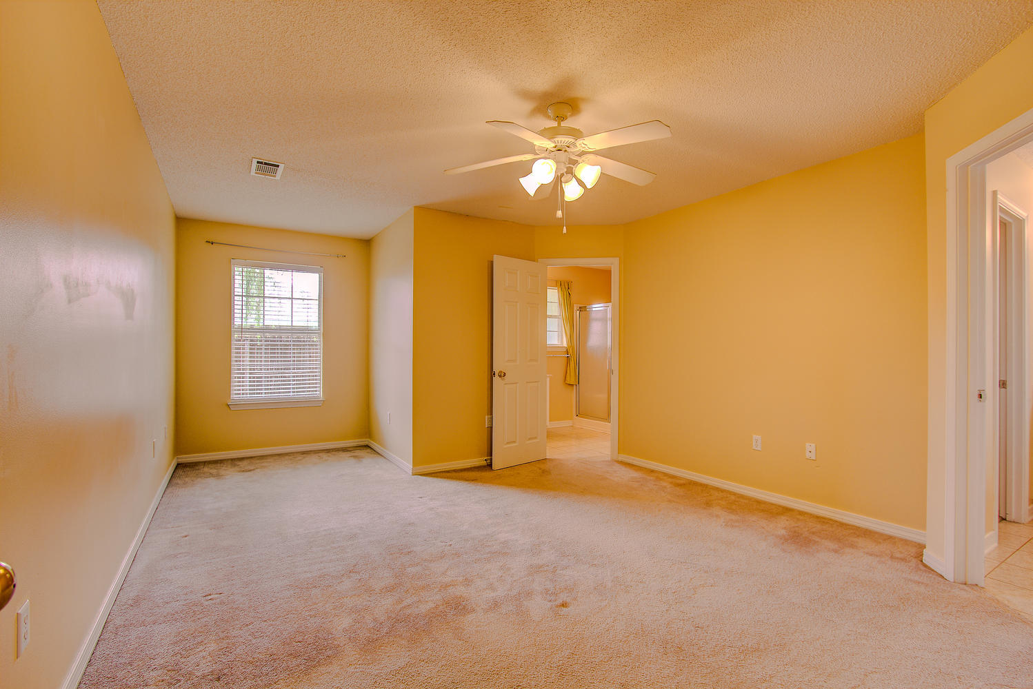 12 Inlet Drive Miramar Beach, FL 32550 - Photo 16 of 27 a view of an empty room with chandelier fan and a window