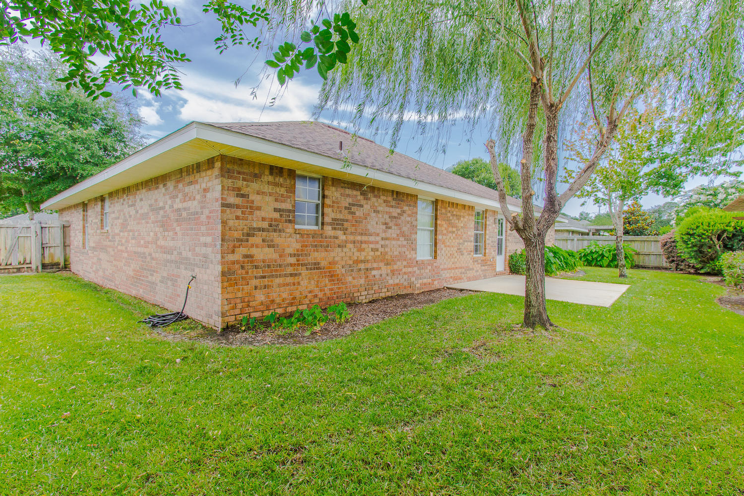 12 Inlet Drive Miramar Beach, FL 32550 - Photo 25 of 27 a view of backyard with small cabin