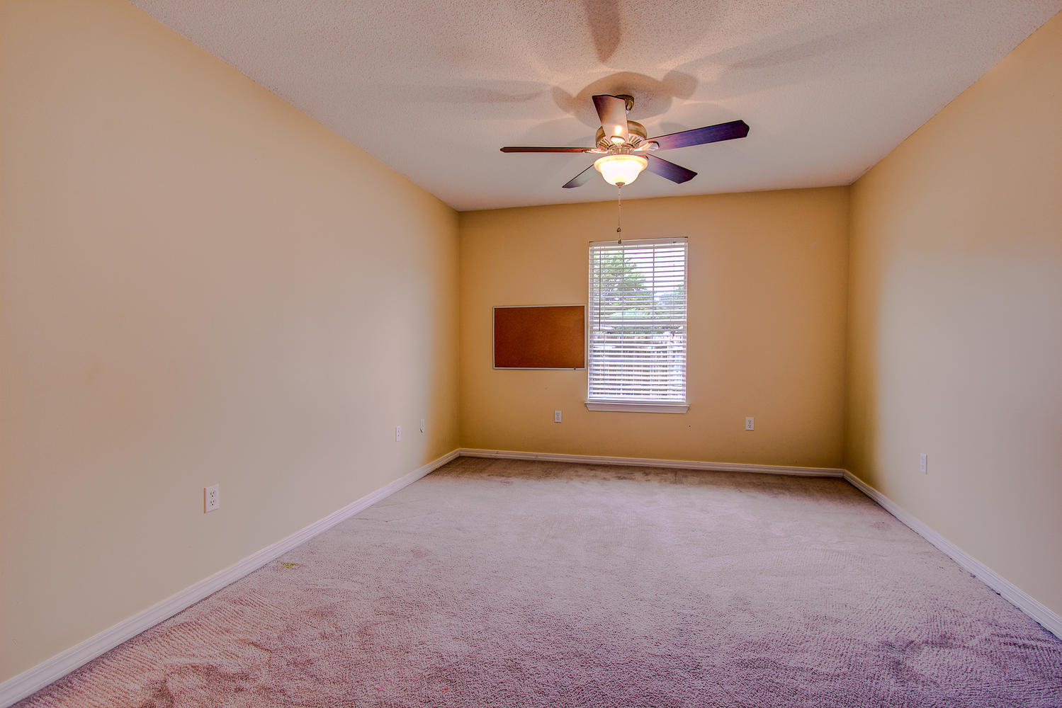 12 Inlet Drive Miramar Beach, FL 32550 - Photo 9 of 27 an empty room with windows and fan