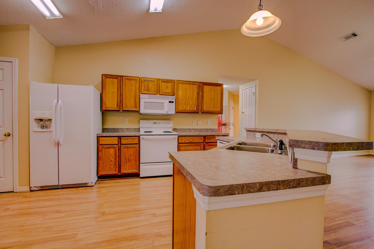 12 Inlet Drive Miramar Beach, FL 32550 - Photo 10 of 27 a kitchen with stainless steel appliances granite countertop a sink and a refrigerator