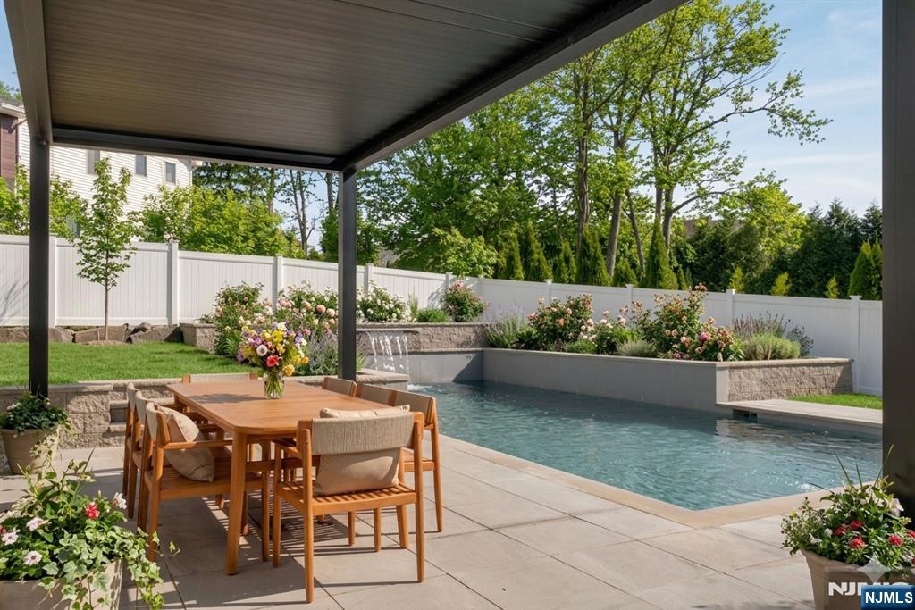 11 Roberts Road Englewood Cliffs, NJ 07632 - Photo 46 of 50 a patio with yard table and chairs