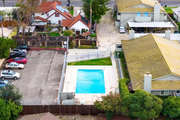 a view of a swimming pool with a lounge chairs