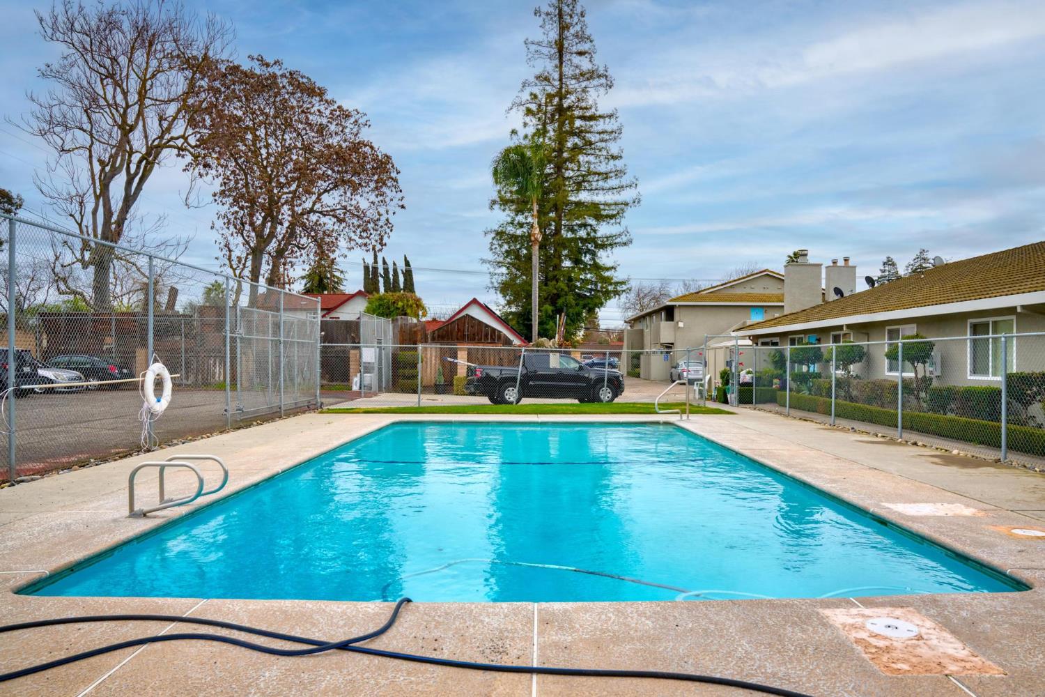 3025 Tully Road Modesto, CA 95350 - Photo 15 of 22 a swimming pool view with a outdoor seating