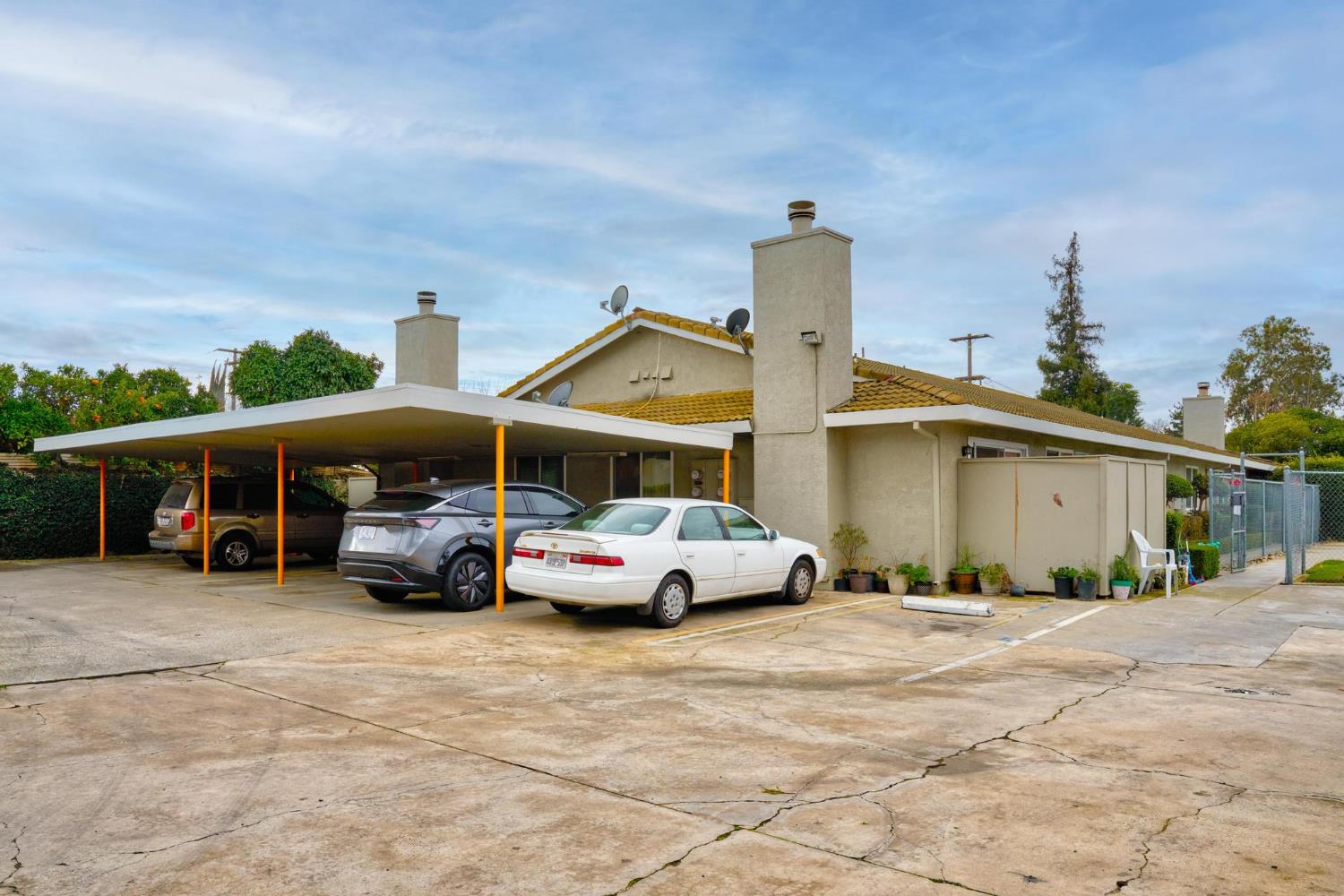 3025 Tully Road Modesto, CA 95350 - Photo 18 of 22 a car parked in front of house