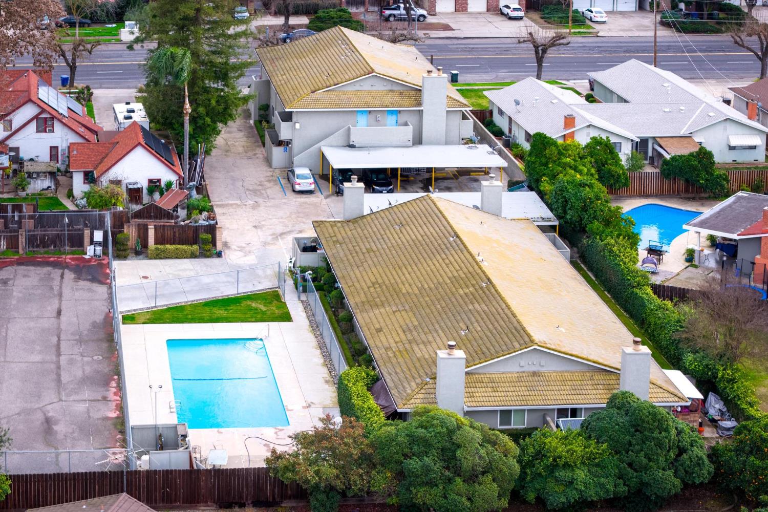 3025 Tully Road Modesto, CA 95350 - Photo 9 of 22 an aerial view of a house with swimming pool