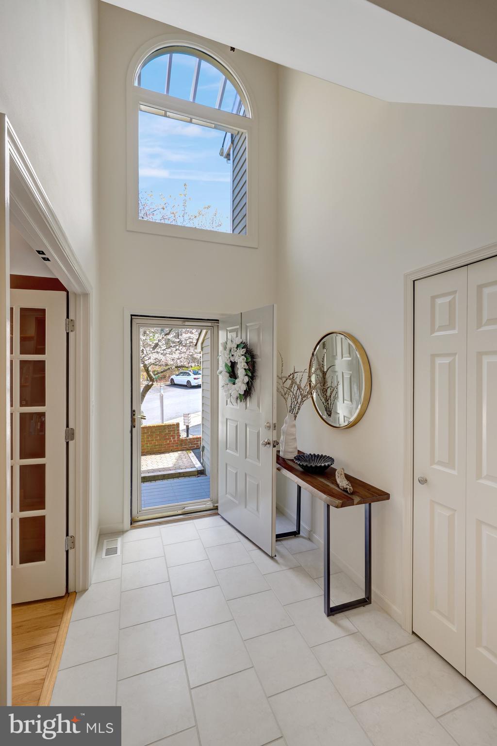 11122 Lakespray Way Reston, VA 20191 - Photo 5 of 77 Two-story entrance foyer with great natural light.