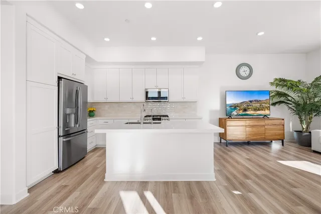 a view of a balcony with wooden floor