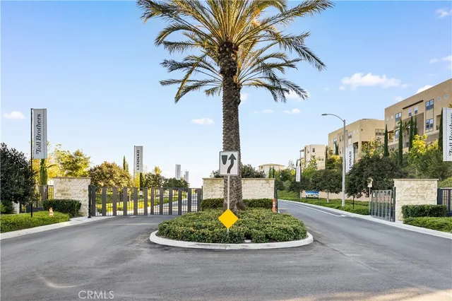 a view of a patio with a table and chairs
