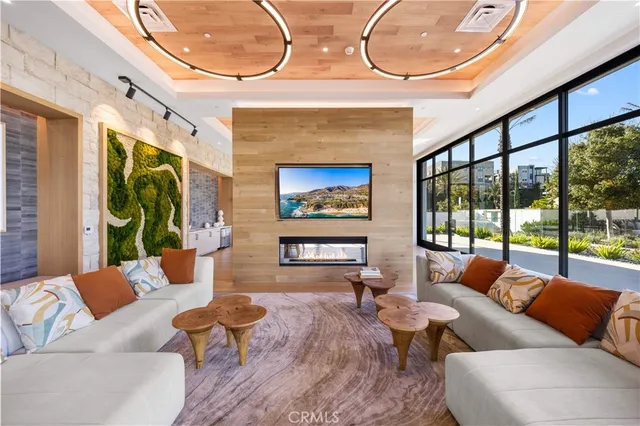 a view of a swimming pool with a table and chairs