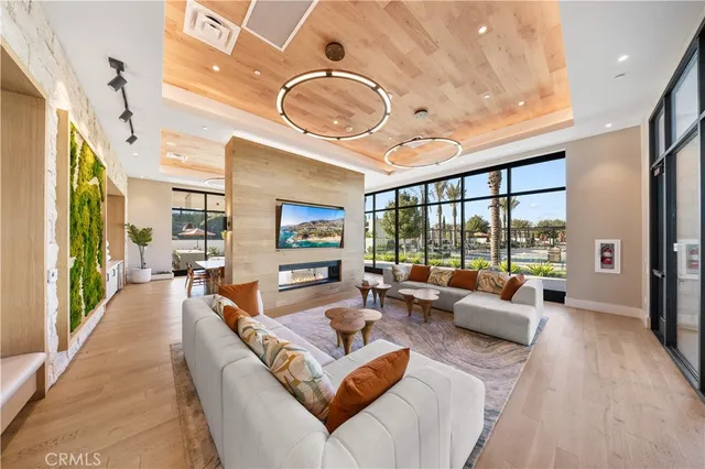 a view of a patio with table and chairs