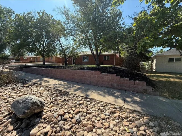 a view of a yard with an outdoor space