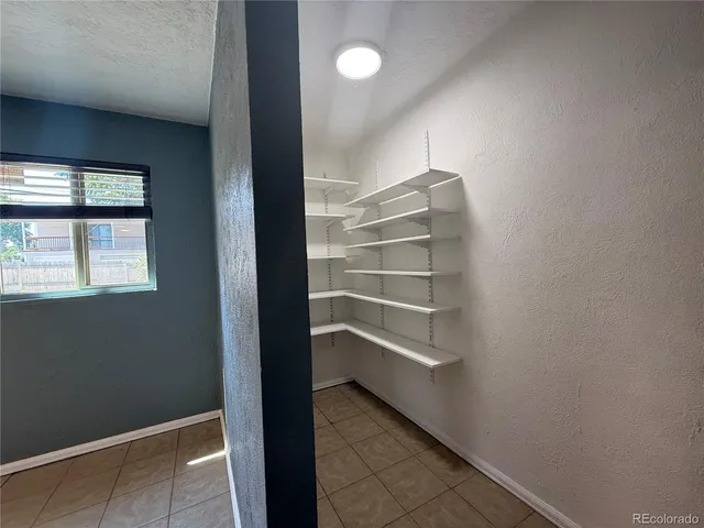 a view of a room with rack on the wall