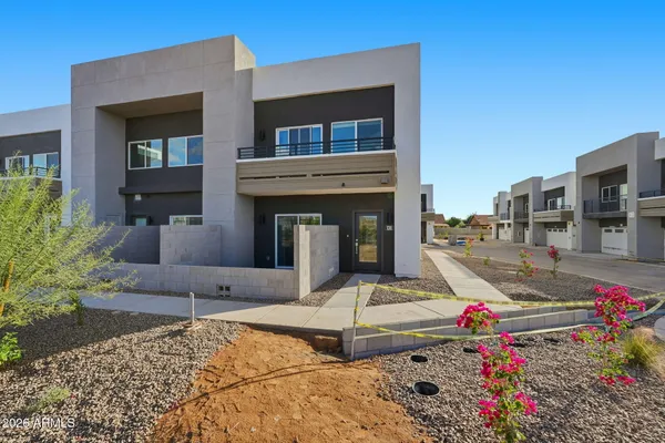a front view of a house with entertaining space