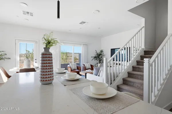 a view of dining room and livingroom with furniture
