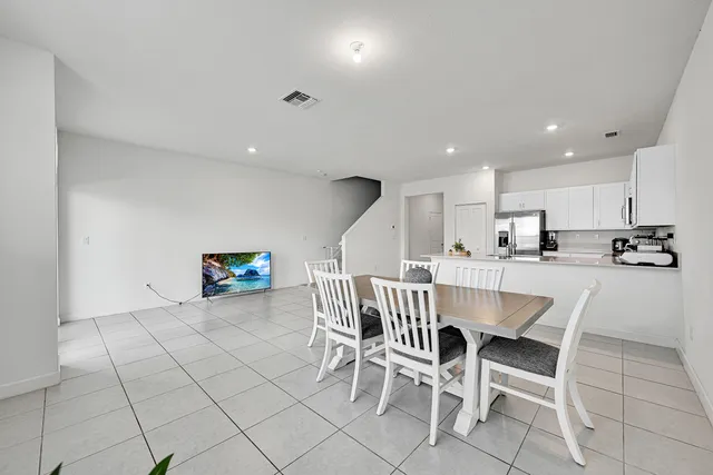 a bathroom with a sink double vanity and shower