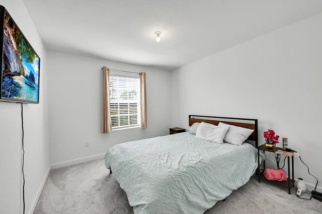 a bathroom with a shower and toilet