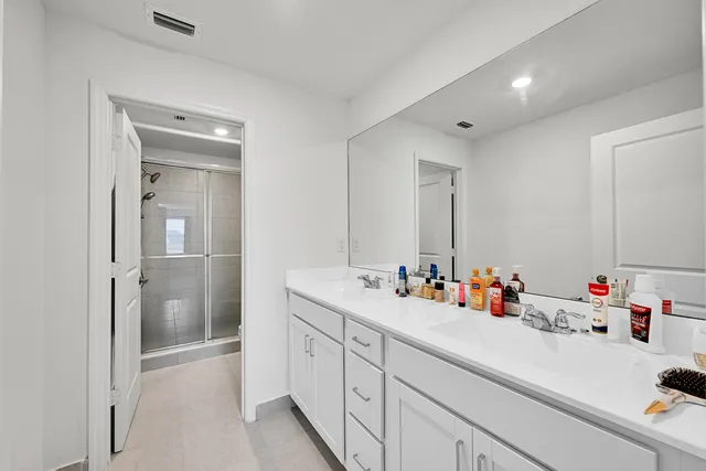 an aerial view of a house with a swimming pool yard and outdoor seating