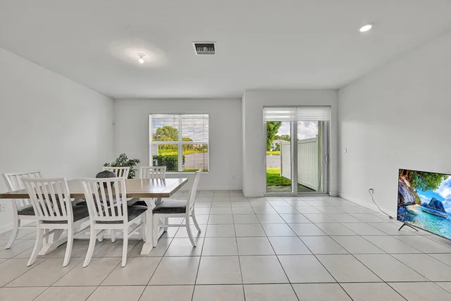 a bathroom with a sink toilet vanity and shower