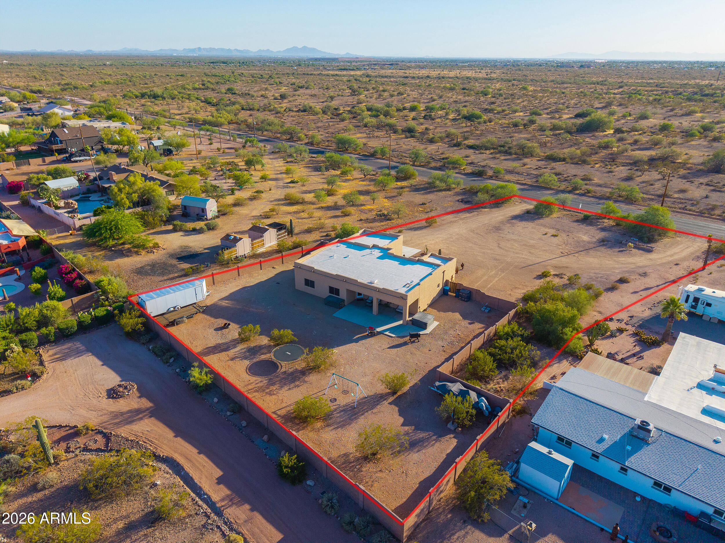 1487 South Mountain View Road Apache Junction, AZ 85119 - Photo 49 of 60 an aerial view of residential houses with outdoor space