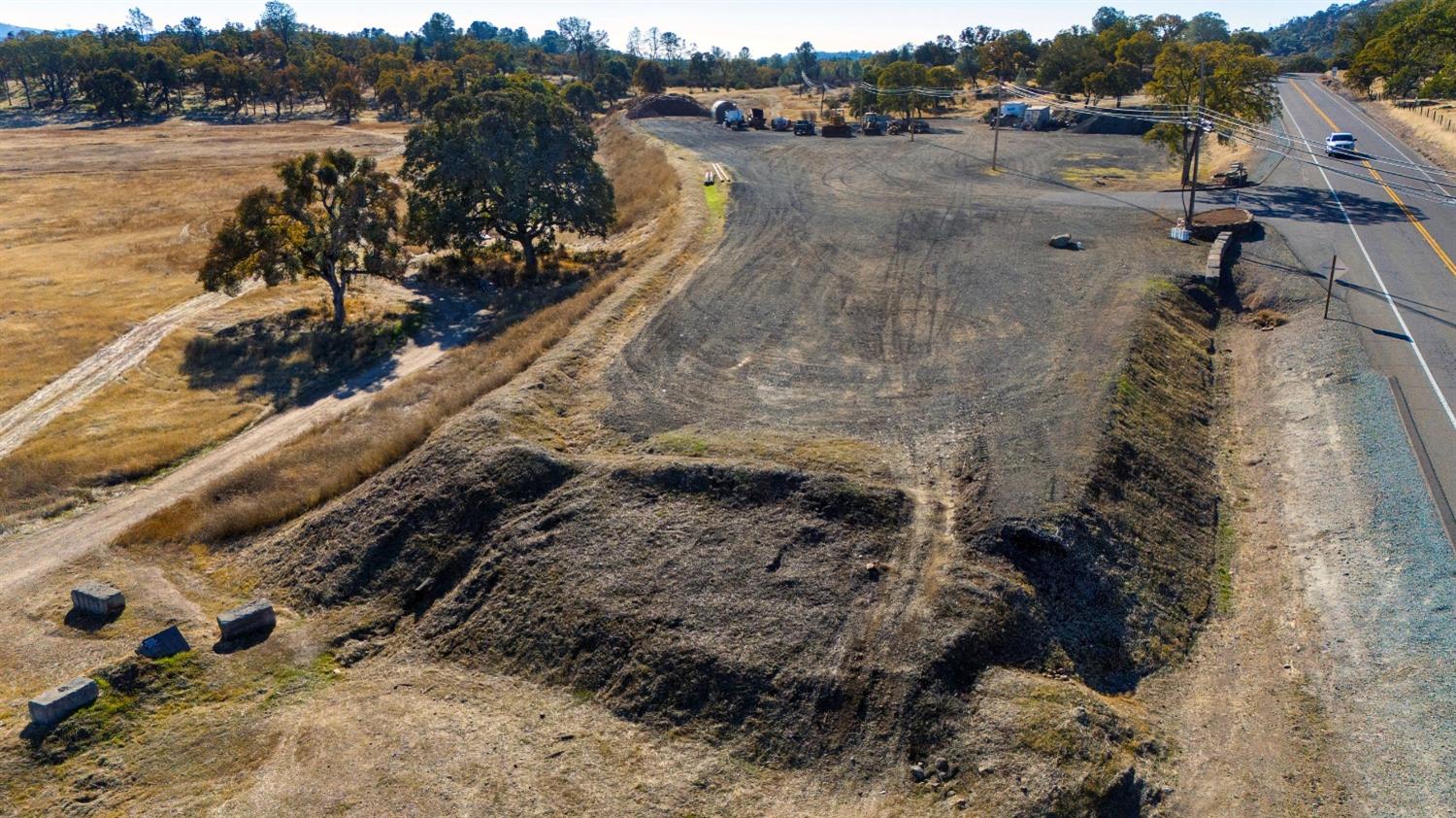 470 Highway 12 Valley Springs, CA 95252 - Photo 12 of 18 a view of a lake with beach and outdoor space