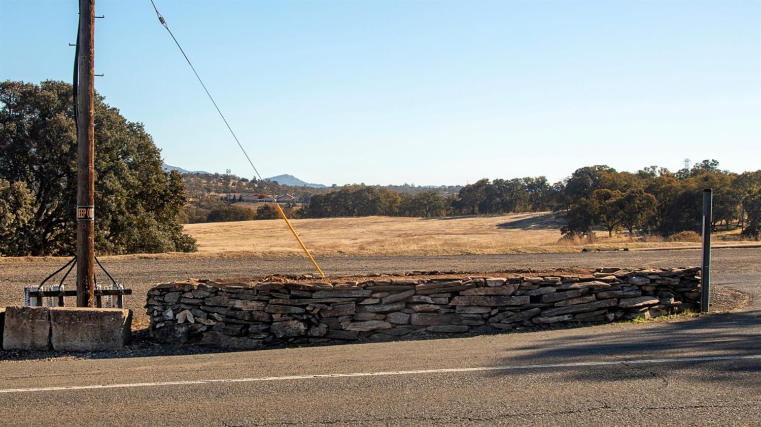 470 Highway 12 Valley Springs, CA 95252 - Photo 6 of 18 a view of a large body of water with a building in the background