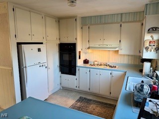 3815 Glen Street Reno, NV 89502 - Photo 13 of 24 a kitchen with cabinets and wooden floor